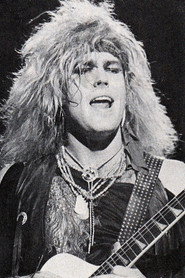 Photo of Robbin Crosby as Guitar