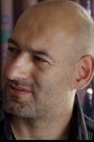 Photo of Jimmy Roussounis as Mossad Officer Barak