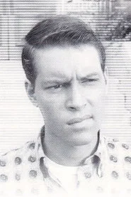 Photo of David Macklin as Alex Heath