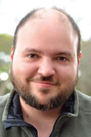 Photo of Daniel Everidge as Radio Anchor