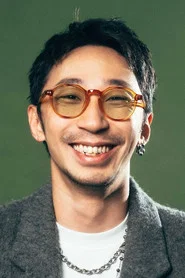 Photo of Edwynn Li as Ah Bin