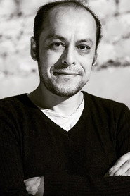 Photo of Alberick García as Minister Néstor