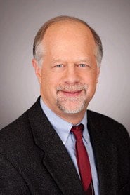Photo of Lawrence H. White as Host