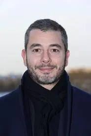 Photo of Ali Baddou as Self - Narrator (voice)