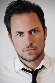 Photo of Justin Zachary as Tommy