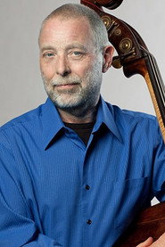 Photo of Dave Holland as Bass