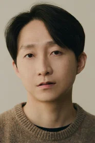 Photo of Ko Yoo-joon as Publishing House Staff