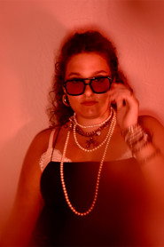 Photo of Ryan Elizabeth Brady as Secretary Cathy