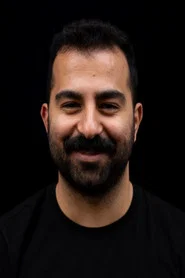 Photo of Ozan Talay as Mert