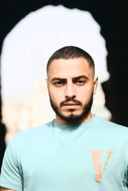 Photo of Ali Mortada as Man in black