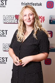 Photo of Mackenzie Larsen as Lucy