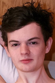 Photo of Bryan Moore as (archive footage)