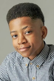 Photo of Travis Blake Hall as Tommy Robson