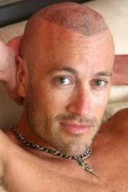Photo of Brodie Newport as Patchett