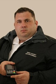 Photo of James King as Enforcement Agent