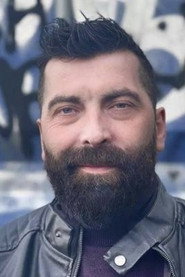 Photo of Andy John Noble as Camera Shop Clerk