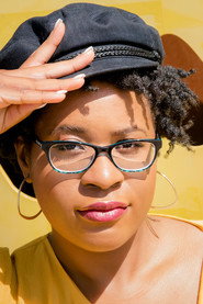 Photo of Cassie Ewulu as Queenie (voice)