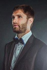 Photo of Fima Ivanov as a salesperson in a luxury boutique