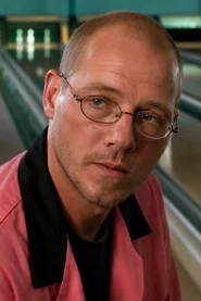Photo of Neil Hope as Derek 'Wheels' Wheeler