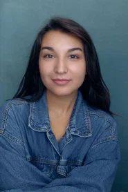 Photo of Elizabeth Lozano as Sian Smith