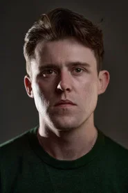 Photo of Niall McNamee as John Martin Reavey