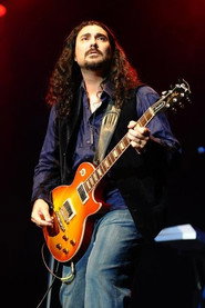 Photo of Alastair Greene as Self - Guitar, Vocals