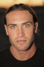 Photo of Greg Duke as (credited as David Taylor) [archive footage]