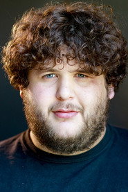 Photo of Sam Black as Armande, Priest