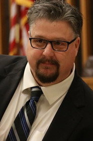 Photo of Chris Gordy as Judge Roger Mulkey