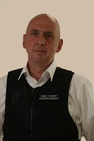 Photo of Mark King as Enforcement Agent