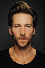 Photo of Troy Baker as David