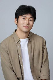 Photo of David Yan as Kim Jong-hoon