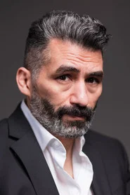 Photo of Tamer Yiğit as Mehmet