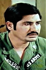 Photo of Ali Khan as Lt Col. Cordel ("Coọc Đen")