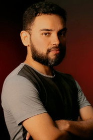 Photo of Elcio Lima as Carlos