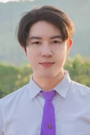 Photo of Fluke Parinya Tulesin as Anan Sutichai