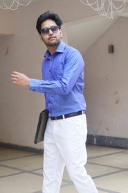 Photo of Ajosh Mora as Uday Trivedi