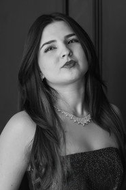 Photo of Jeni Christ as Ingrid Taubaté