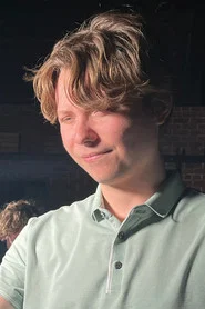 Photo of Sebastian Amrozy as Captain Bobby