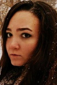 Photo of Andreea Bosneag as Delia Cristina Fratila