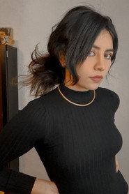 Photo of Anne López as Ana
