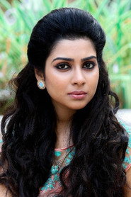 Photo of Satna Titus as Magizhini