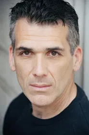 Photo of Adrian Neil as Simon
