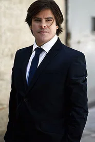 Photo of João Ferrador as Tobacconist's owner