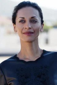 Photo of Kira Wilkinson as Dr. Leavenson