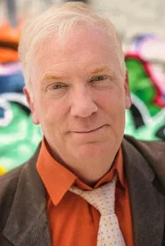 Photo of David C. Jones as X