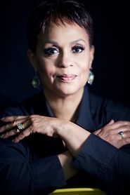 Photo of B.J. Arnett as Janelle Moore