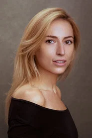 Photo of Eva-Marie Kung as Millie Harkness