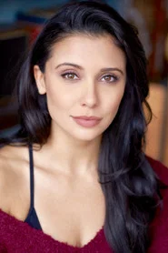Photo of Emily Shah as Roshni Thakkar