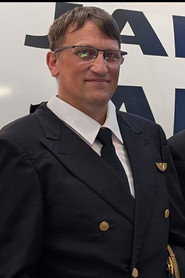 Photo of Lee Glattback as Captain